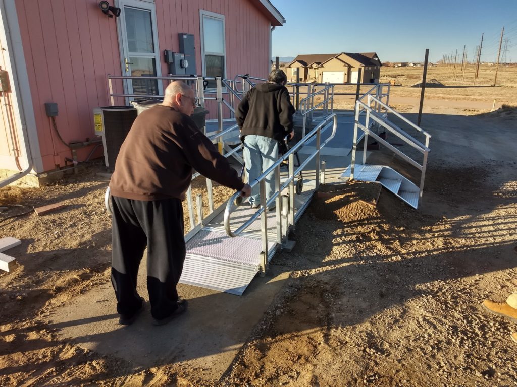 People walking on wheelchair ramp- Colorado Springs- CO